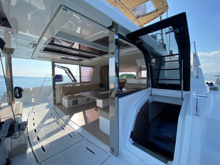 Bali 4.8 Baša catamaran 2020 adriatic charter miles cockpit door