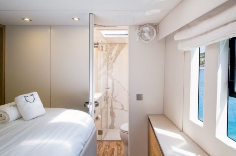 Sunreef 60 Vulpino luxury catamaran guest cabin double bed toilet