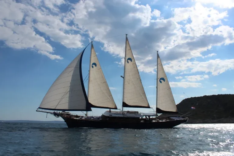 gulet barba outside sailing with sails side