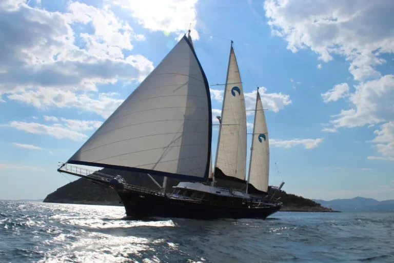 gulet barba outside sailing with sails bow